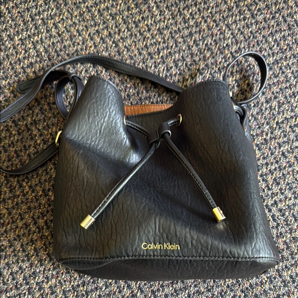 Calvin Klein Black Leather Shoulder Bag with Gold Accents